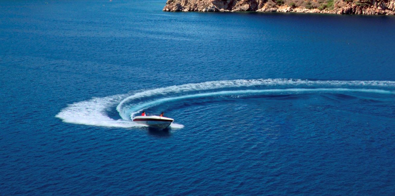 Power boat at Kalamar beach club