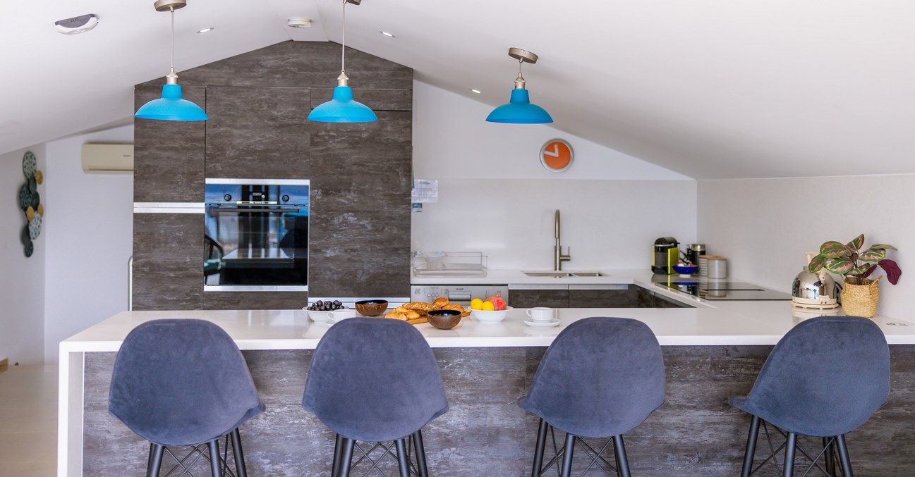 Kitchen From Behind Stools